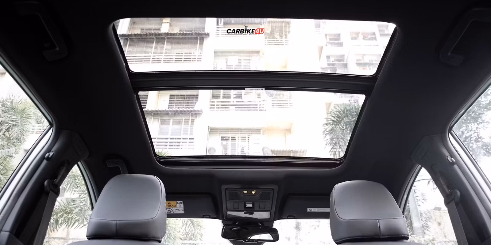 https://img.carbike4u.com/news/large/ tata-nexon-panoramic-sunroof-affordable-suv -mainImages-1105.avif
